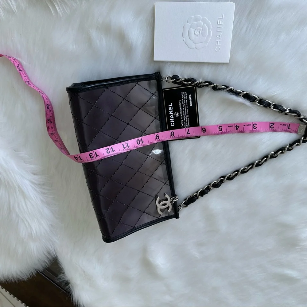 CHANEL Silver Quilted PVC Shoulder Bag with Black Trim